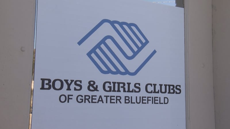 Kids from the club wore costumes and went door-to-door in downtown Bluefield, handing out...