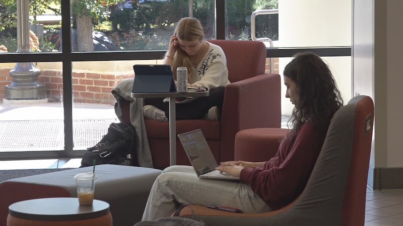 Virginia Tech students study on campus. The university built its own AI platform, HokieAI, to...