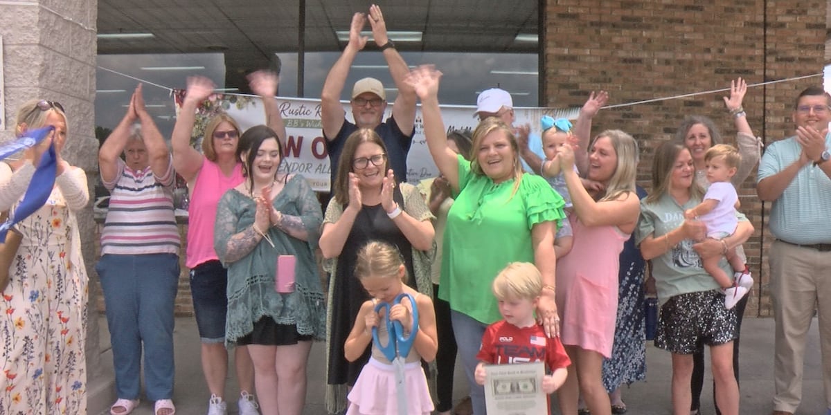 Sisters celebrate the grand opening of their new business