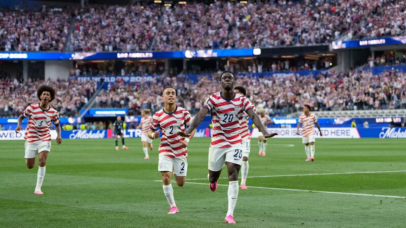 United States' Folarin Balogun (20) celebrates scoring his side's third goal against Paraguay...